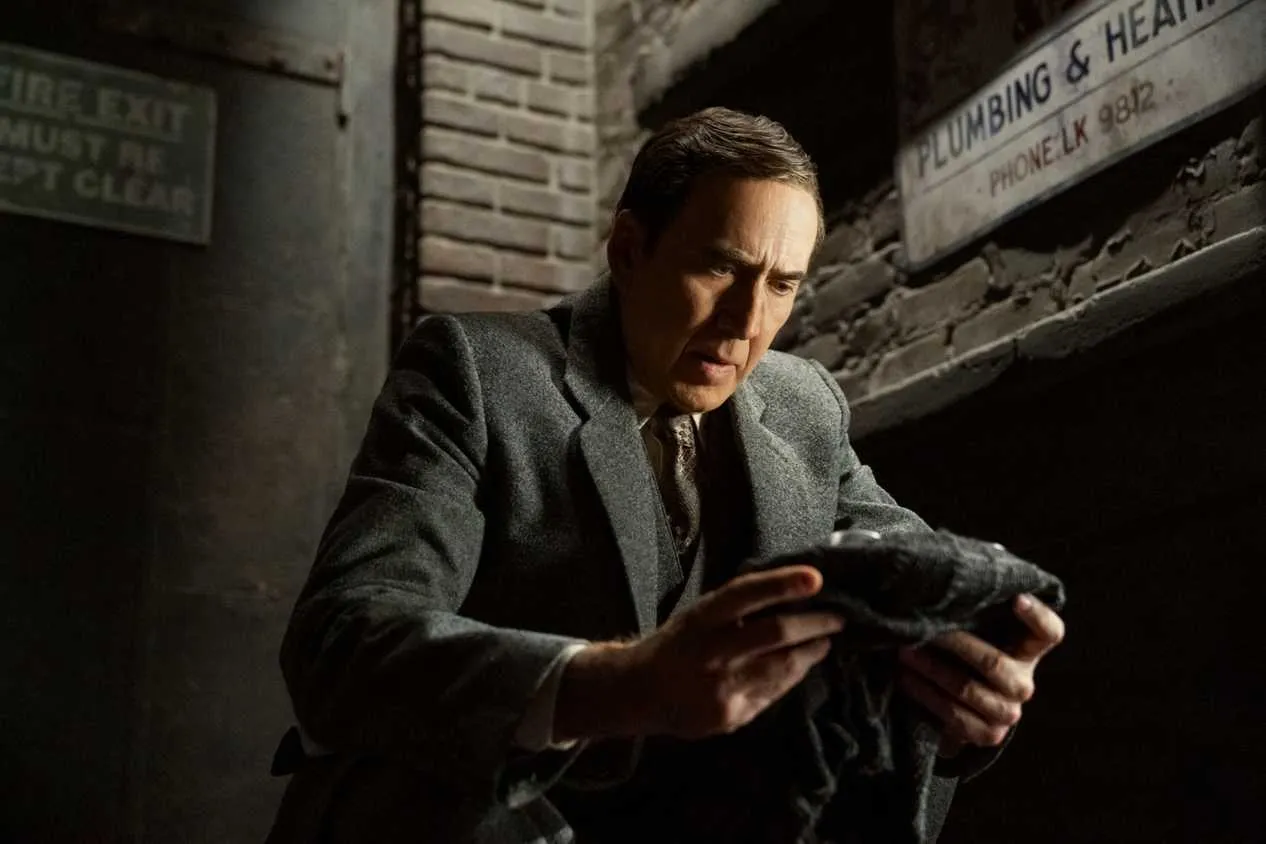 Nicolas Cage dons the iconic mask. image 1