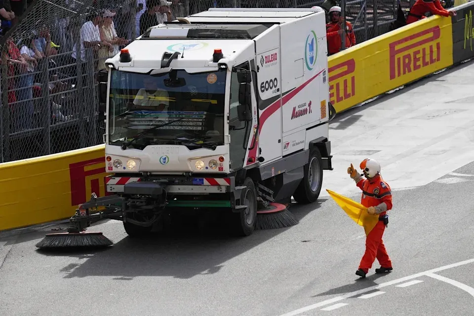 Racing resumes after the track is cleared temporarily. image 1